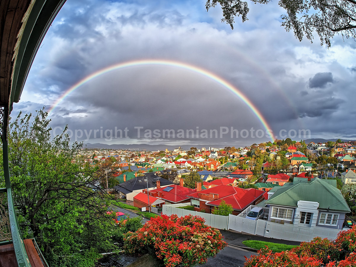 Rainbow over Hobart City from West Hobart, Tasmania.  (martin chambers: tasmanianphotos.com) (24/09/20) : Hobart-City-West-Hobart-Rainbow-Tasmania_20200924-185050